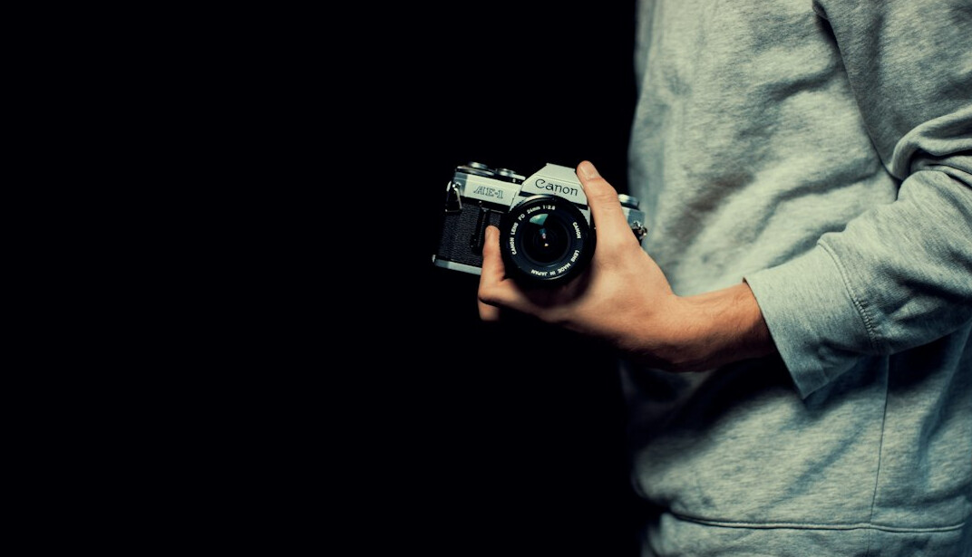 Photojournalist holding a camera